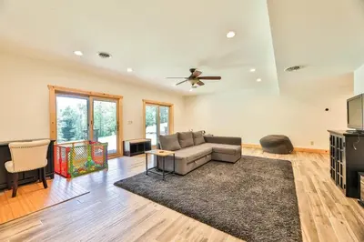 a living room with a couch and a table at Luxurious Home & Amazing Views in Windham
