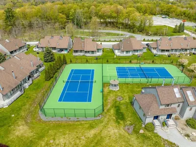 an overhead view of a tennis court with two tennis at Windham Mountain Village Condo in Windham