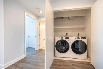 a laundry room with a washer and dryer at Private Luxury Apt with Gym in Stamford