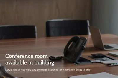 a conference room with a phone on a desk at Blueground Midtown West gym doorman wd NYC-1560 in New York