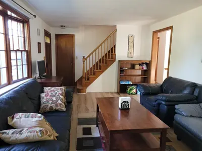 a living room with a couch and a coffee table at East Granby with AC and WiFi 3 minute to Bradley in East Granby