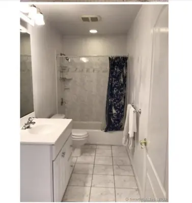 a bathroom with a sink and a toilet and a shower at Enjoy all Westport has to offer! in Westport