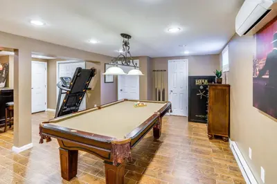 a living room with a pool table in it at Private Hot Tub on 10 Acres Cozy Catskill Getaway in Catskill