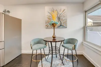 a dining room with a table and two chairs at 1 Mi to Train Station Quiet Apartment in Newark in Newark