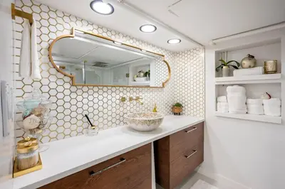 a bathroom with a sink and a mirror at Romantic Hideout 1Bedroom Lower Level in Stamford