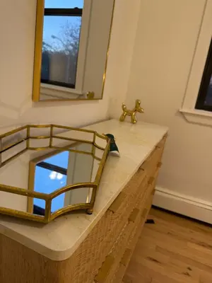 a mirror sitting on top of a wooden counter at Luxury Boutique Home - 4 Beds 1 Baths 25 minutes to NYC in Jersey City