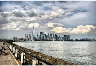 a view of a city from the water at Apart Studio West NYNJ 12Mints From NYCity TimeSquare in West New York