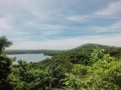 a view of a lake from the top of a mountain at The Little Lake Cabin in New Fairfield