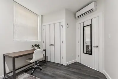 a home office with a desk and a chair at Washington Lofts 109 Spacious 1 Bedroom 1 Bath in Albany