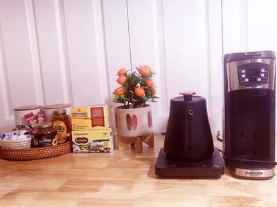a coffee maker sitting on a counter next to a blender at Serenity Escape in Hudson Valley in Hopewell Junction