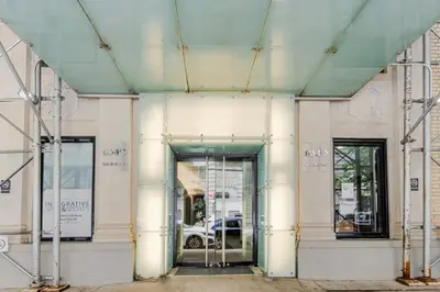 an entrance to a building with a revolving door at Blueground Upper West Side ac wd NYC-1546 in New York