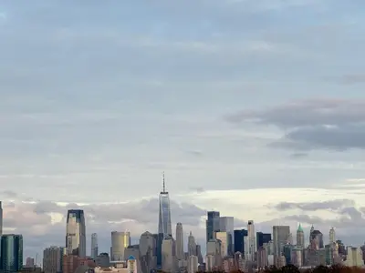 a view of a large city with skyscrapers at Stunning NYC rooftop views minutes away from NYC 2 bedroom 2 bath in Jersey City