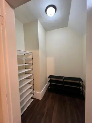 an empty room with a shelf and a ceiling at Holyoke House Oasis - Calm Trips in Holyoke