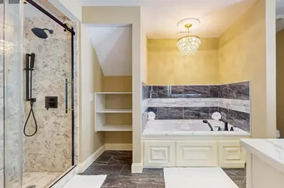 a bathroom with a tub and a shower at Near Medical Center! Remote-Work Hub in Holyoke in Holyoke