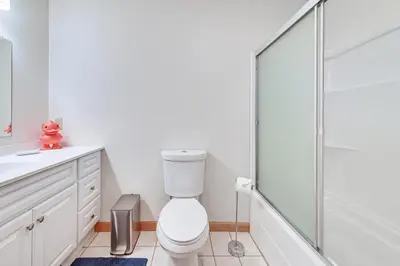 a bathroom with a toilet and a glass shower at Mtn-View Home with Deck on 4 Acres in Windham in Windham