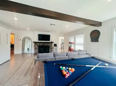 a living room with a pool table in it at Blue House, King Bed, Grill, Pool Table, Air Hockey, Ping Pong in New Fairfield