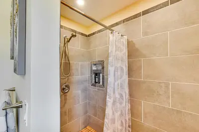 a bathroom with a shower with a shower curtain at Brushridge Mountain House Ski, Hike and Fish in Fleischmanns