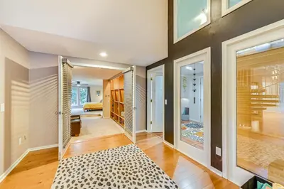a hallway of a home with a rug at 7 Mi to Skiing Lake George Home with Large Patio in Queensbury