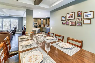 a dining room with a table and chairs at Mountain Views and Brook Access Home in Arkville! in Arkville