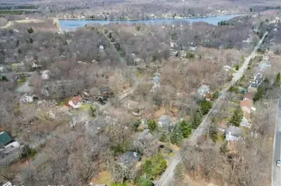 an aerial view of a town with trees and a river at poconos mountain luxury cozy vacational house in the heart of Poconos in Tobyhanna