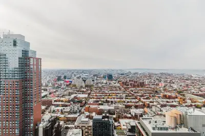 an aerial view of a city with tall buildings at Blueground Downtown BK gym wd nr BAM NYC-1685 in Brooklyn