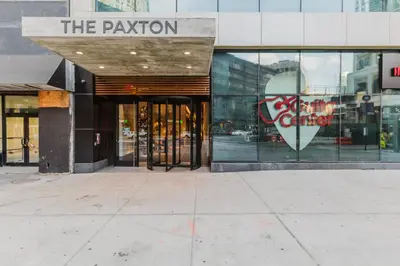 a store with a sign on the front of a building at Blueground Downtown BK gym wd nr BAM NYC-1685 in Brooklyn