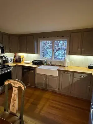 a kitchen with a sink and a window at The 1782 Darling House on the Litchfield Green in Litchfield
