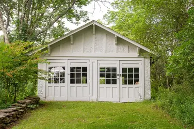 a white garage with a lot of windows at Casa Catskills in Margaretville