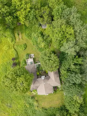 an overhead view of a garden with a table and trees at Casa Catskills in Margaretville
