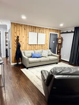 a living room with a couch and a table at Vernon Cozy 2BD Pet-Friendly Mountain Creek in Vernon