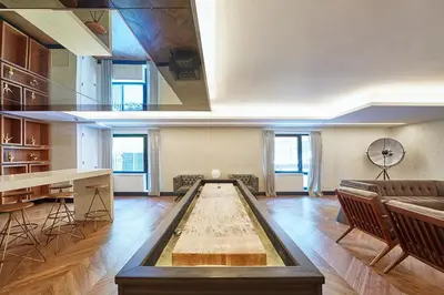 a living room with a pool table in the middle of it at Blueground Clinton Hill gym AC nr park NYC-1674 in Brooklyn