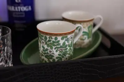 two cups and saucers sitting on a tray at Doctor Sax House in Lenox