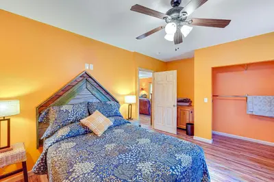 a bedroom with a bed and a ceiling fan at Near Historic Sites Bright Hyde Park Guest Suite in Hyde Park