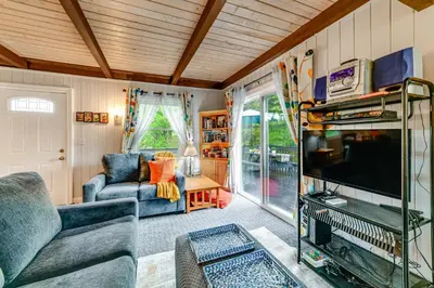 a living room with a couch and a tv at Catskills Mountain Casita Ski, Hike, Fish and Golf! in Denver