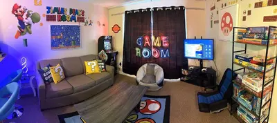 a living room with a couch and a television at Game Night Suite at Jiminy Peak Ski OnOff Sleeps 4 in Hancock