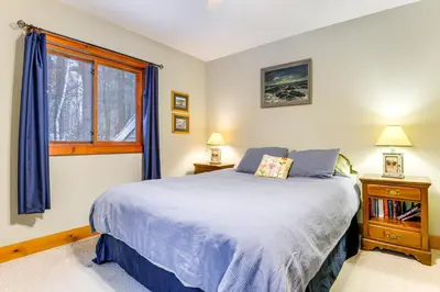 a bedroom with a bed and a window at 7 Mi to Mt Snow Resort Family Home with Fire Pit! in Dover