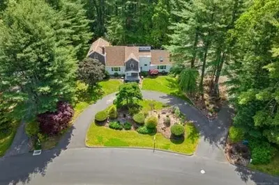 an aerial view of a house with a driveway at remember2giggle at gee mail to discuss and inquire in Avon