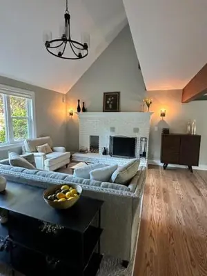 a living room with a couch and a fireplace at remember2giggle at gee mail to discuss and inquire in Avon