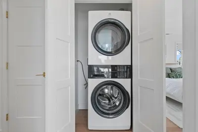 a washer and dryer in a white room at Stareway to Heaven in Fairfield