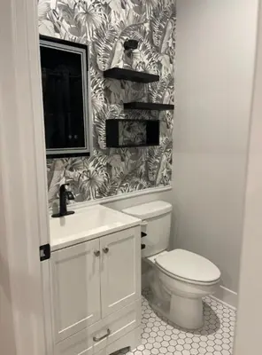 a bathroom with a toilet and a sink at 4br 5ba 4 Car Parking Bonus Rm and Back Yard in East Newark