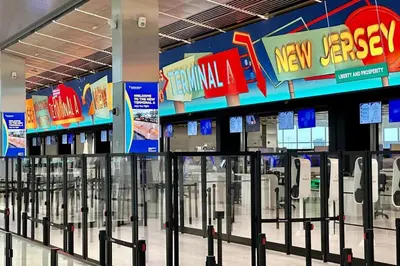 a store with a row of parking meters at 1A Prime Area Near NYC and EWR 98 Walk score in Newark