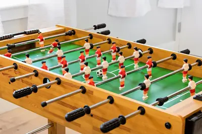 a large chess board with a group of toy men playing a game at 1C - Ask About 20Off - Sleeps 5 - Airport 8min - NYC 30min in Newark
