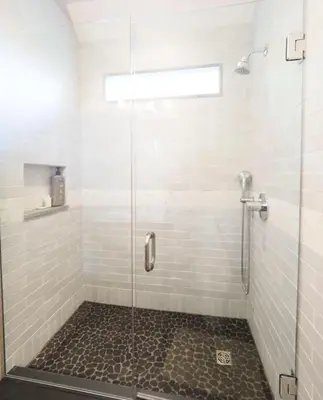 a bathroom with a shower with a glass door at Charming 6 Bdrm Countryside Stay, Sauna and HotTub in North Egremont