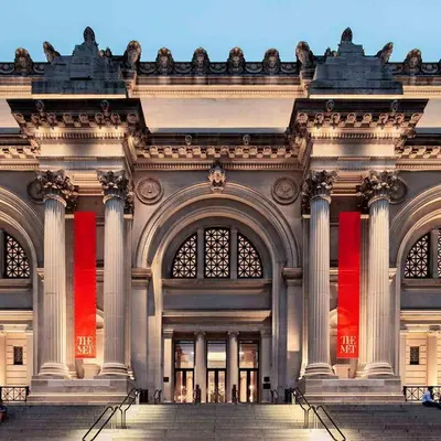 a facade of a building with red ribbon at SWJ 4 - 25 Min to Times Sq Save on 2Day Stays in New York
