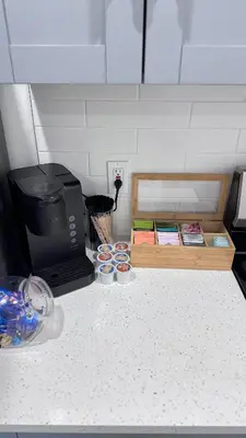 a kitchen counter with a microwave and some cupcakes at Beautiful Bedroom with Attached Bathroom, 15 minutes from NYC in West New York