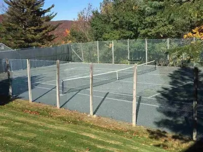 a tennis court with two tennis courts at 2BD 1BA - Mount Snow VT - Ski-Back Trail - Shuttle in Dover