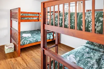 a bunk bed room with two bunk beds at Spacious 3BR House, Hot Tub, Firepit, Ski Access! in Emerald Lakes