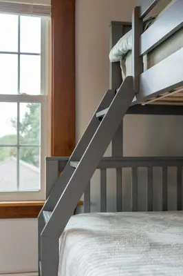 a bunk bed in a bedroom with a bunk bedutenewayangering at Beechmont-Charming Colonial for Events and Getaways! in Bridgeport