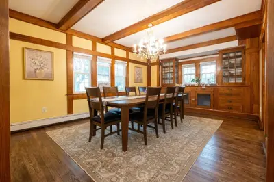a dining room with a table and chairs at Beechmont-Charming Colonial for Events and Getaways! in Bridgeport