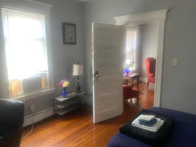 a living room with a door leading to a living room at SouthGreen APT 2S in Hartford